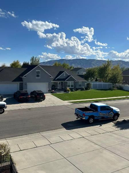 Snow-covered residential roof in Panguitch, Utah at high elevation
